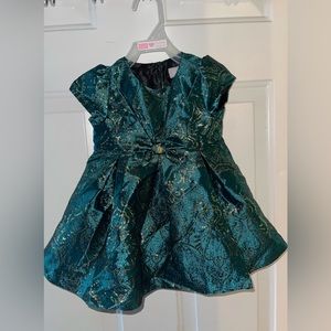 Baby girl dress in green. Never worn.